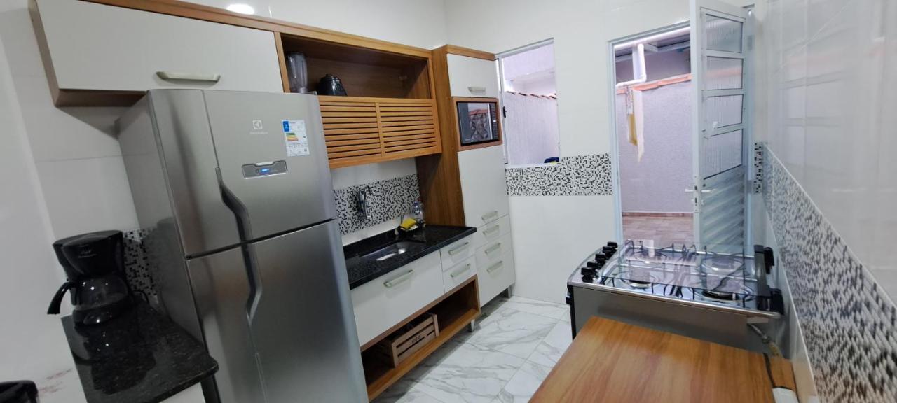 Casa Com Piscina Em *